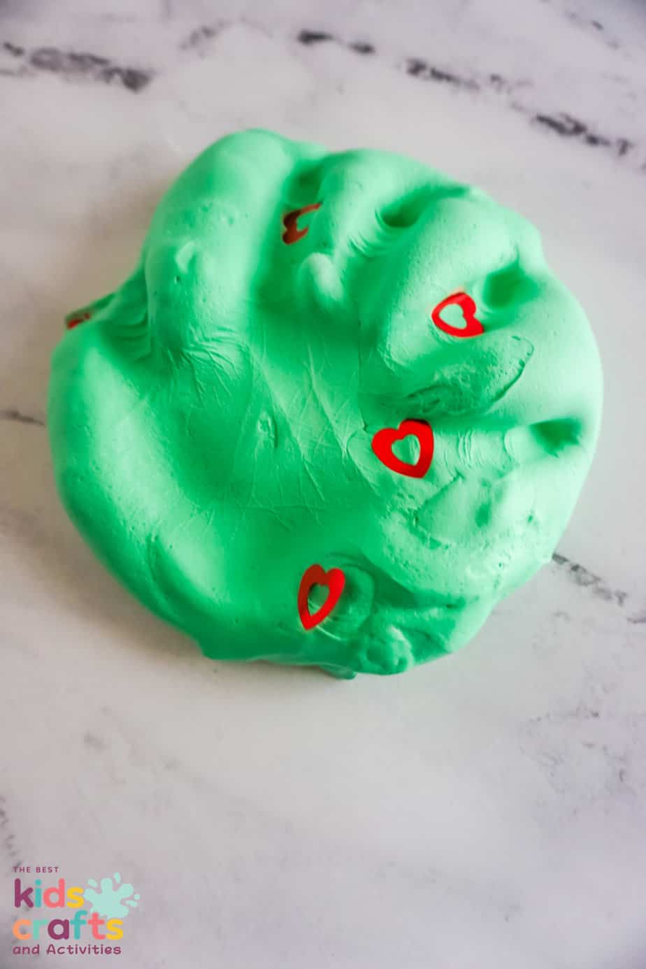 handprint in grinch butter slime